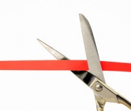 rotes Band und Schere
